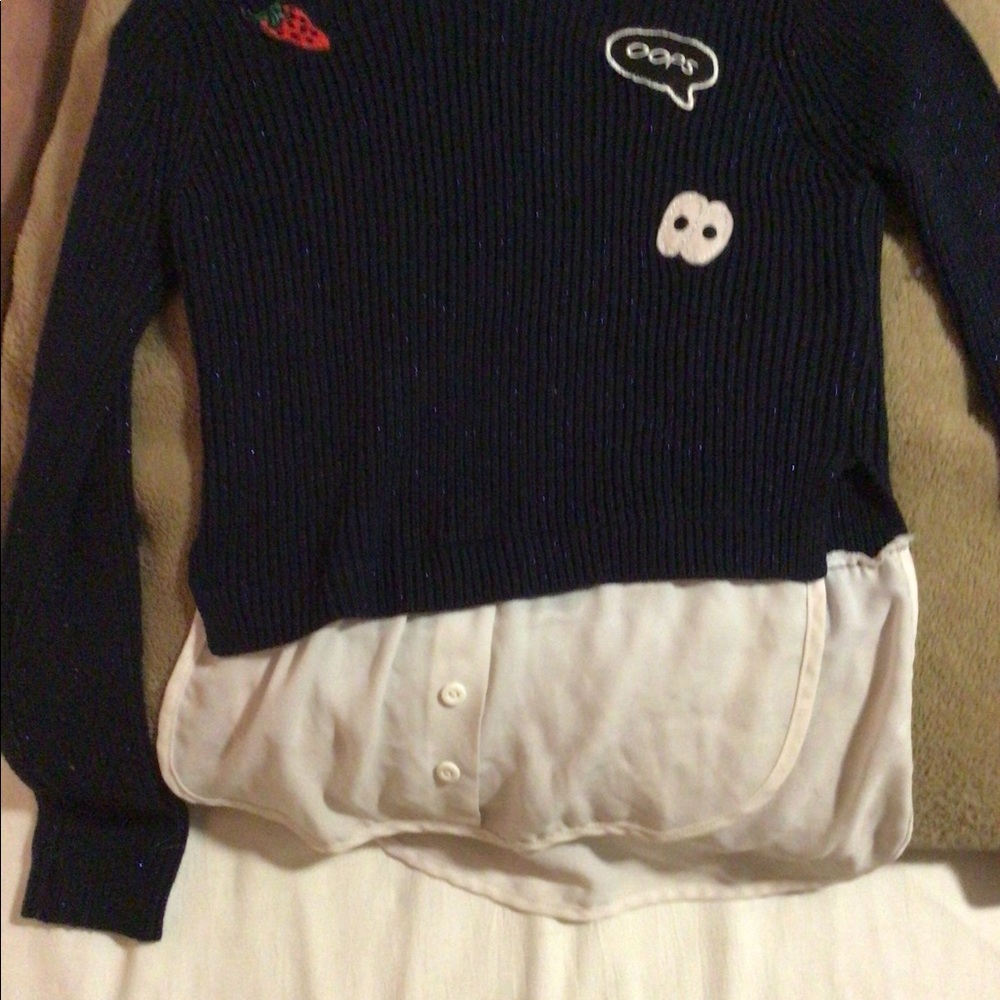 Long sleeved one piece shirt.